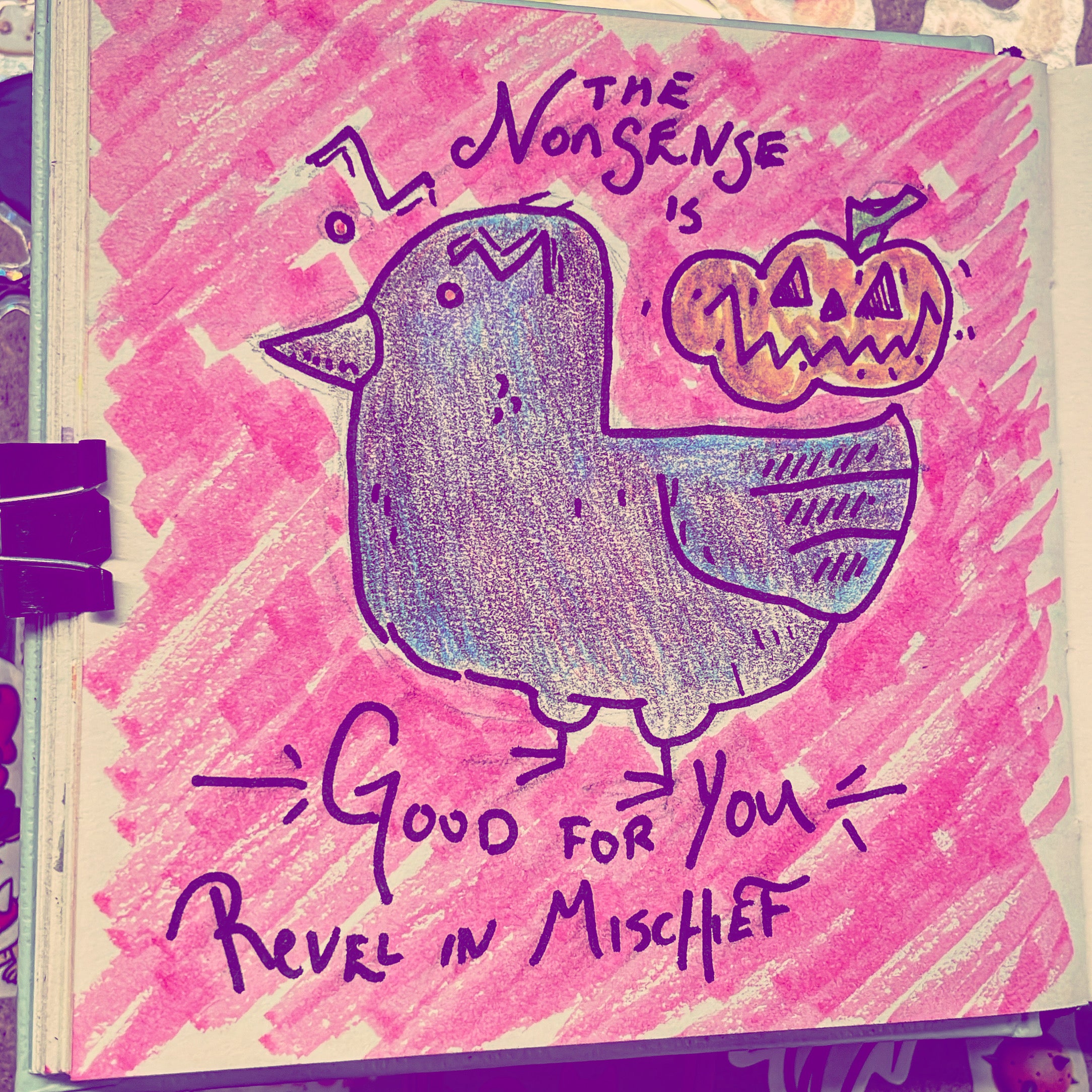 A raven with a jack-o-lantern. Caption: "The nonsense is good for you. Revel in mischief."